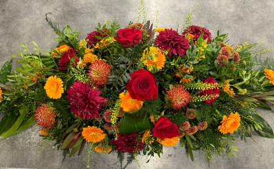 Red, Russet & Orange Casket Spray